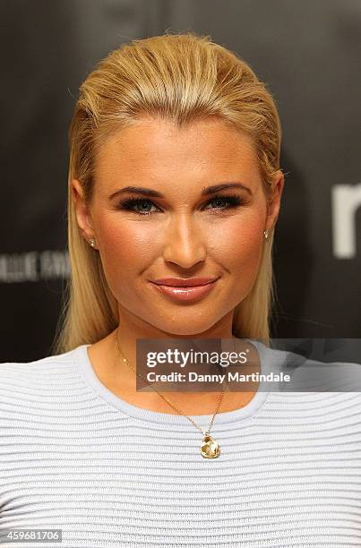 Billie Faiers attends a photocall to launch The Signature Range at Mothercare Oxford Street on November 28, 2014 in London, England.