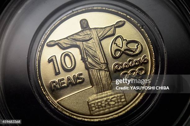 Gold coin from a set of the first edition of commemorative coins of the Rio 2016 Olympic and Paralimpic games is showed at the Central Bank of Brazil...