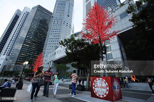 Trees line up the river banks of the Singapore River at Boat Quay on November 28, 2014 in Singapore. The annual light-up festival, 'Christmas by the...