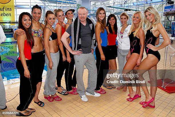Stefan Raab and participant attend the TV Total Turmpringen photocall on November 28, 2014 in Munich, Germany.