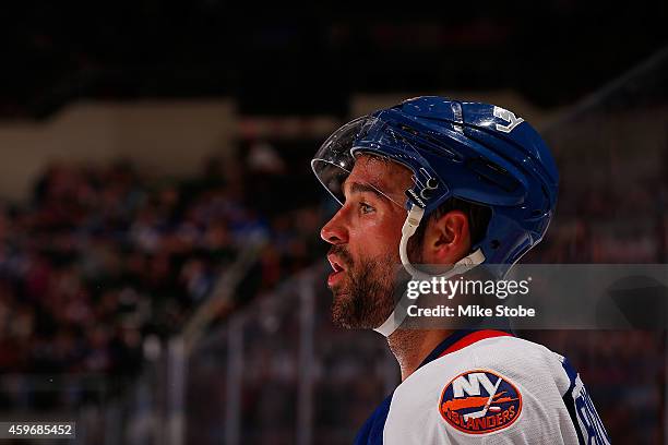 Johnny Boychuk of the New York Islanders skates against the Washington Capitals at Nassau Veterans Memorial Coliseum on November 26, 2014 in...