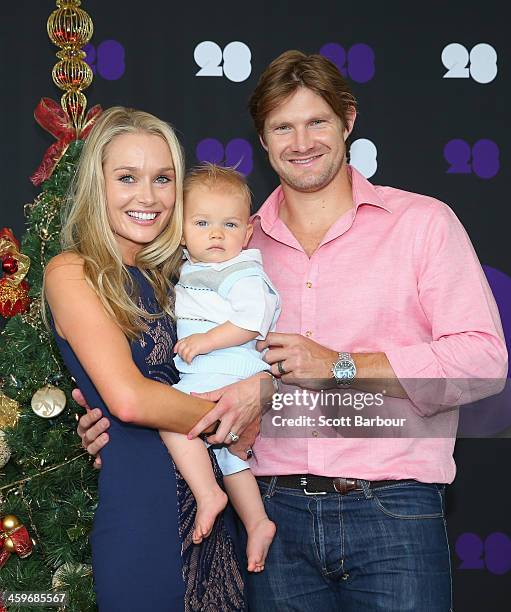 Shane Watson of Australia poses with his wife Lee Watson and son Will ahead of the Cricket Australia Christmas Day Lunch at Crown Metropol on...