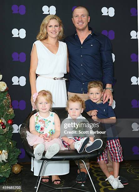 Brad Haddin of Australia poses with his wife Karina Haddin and children Mia, Hugo and Zac ahead of the Cricket Australia Christmas Day Lunch at Crown...