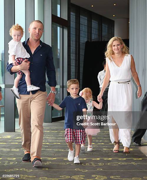 Brad Haddin of Australia poses with his wife Karina Haddin and children Mia, Hugo and Zac ahead of the Cricket Australia Christmas Day Lunch at Crown...