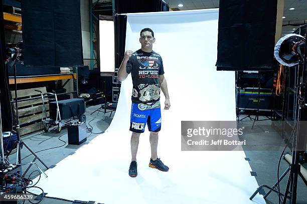 Middleweight Champion Chris Weidman poses for a post-fight portrait after defeating Anderson Silva by TKO during the UFC 168 event at the MGM Grand...