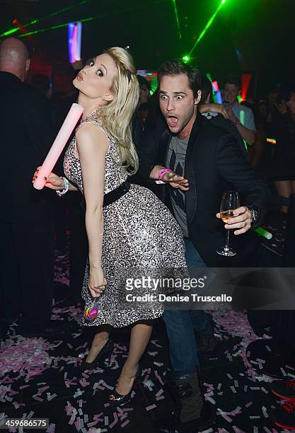 Holly Madison and Josh Strickland celebrate Holly Madison's birthday at Moon Nightclub at the Palms Casino Resort on December 28, 2013 in Las Vegas,...