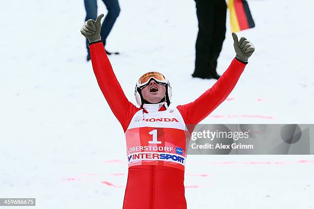 Former Olympian Eddie "The Eagle" Edwards attends a show jumping event on day 2 of the Four Hills Tournament Ski Jumping event at...