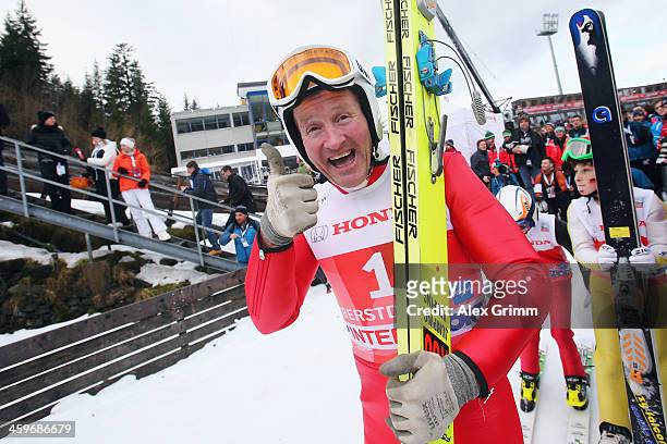 Former Olympian Eddie "The Eagle" Edwards attends a show jumping event on day 2 of the Four Hills Tournament Ski Jumping event at...