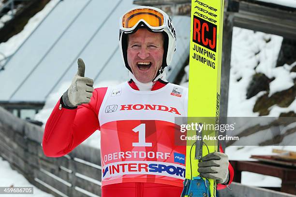 Former Olympian Eddie "The Eagle" Edwards attends a show jumping event on day 2 of the Four Hills Tournament Ski Jumping event at...