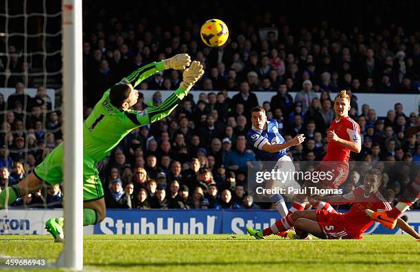 Seamus Coleman of Everton scores the opening goal during the Barclays Premier League match between Everton and Southampton at Goodison Park on...