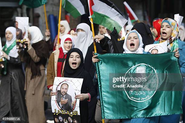 Jordanian Muslim Brotherhood supporters attend a protest to demand the release of detained Zaki Bin Irsheid, Secretary General of Islamic Action...