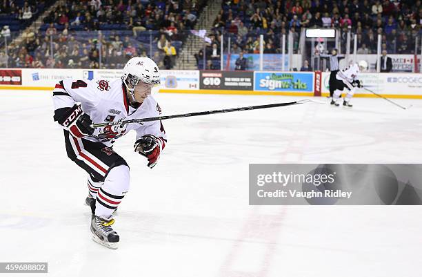 Vince Dunn of the Niagara IceDogs skates during an OHL game between the Belleville Bulls and the Niagara IceDogs at the Meridian Centre on November...