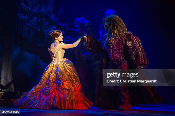 Actress Kitti Jenes performs with partner on stage during a rehearsal for the musical 'Beauty and the Beast' at Admiralspalast on November 28, 2014...