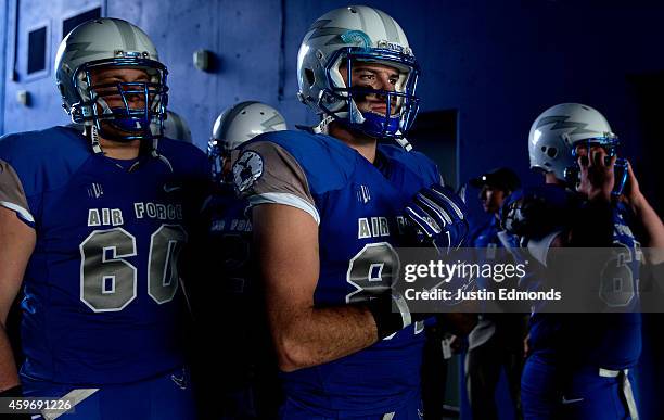Tight end Keith Link of the Air Force Falcons prepares to take the field with teammates before a game against the Colorado State Rams at Falcon...