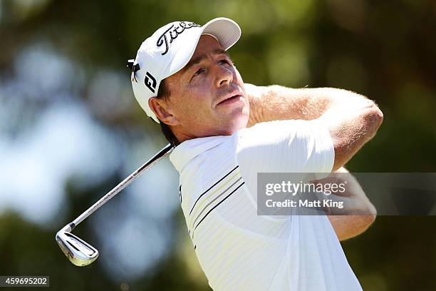 Brett Rumford of Australia tees off on the 4th hole during day three of the Australian Open at The Australian Golf Course on November 29, 2014 in...