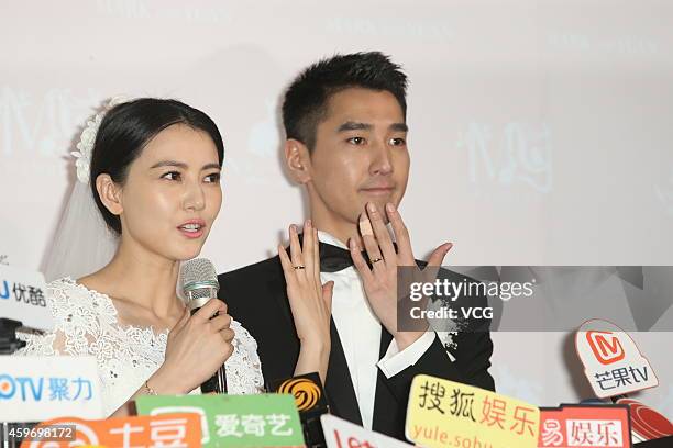 Actress Yuanyuan Gao and actor Mark Zhao receive interview during their wedding ceremony at Le Meridien Taipei Hotel on November 28, 2014 in Taipei,...