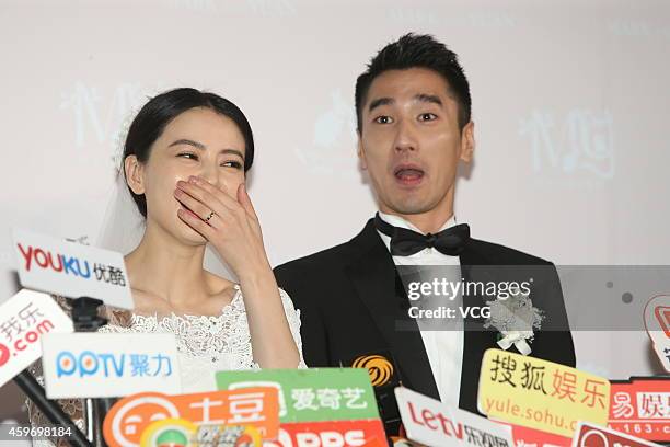 Actress Yuanyuan Gao and actor Mark Zhao receive interview during their wedding ceremony at Le Meridien Taipei Hotel on November 28, 2014 in Taipei,...