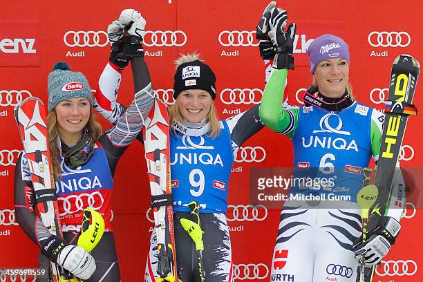 2nd placed Mikaela Shiffrin of The USA, race winner Marlies Schild of Austria and 3rd placed Maria Hoefl-Riesch of Germany on the podium for the FIS...