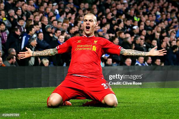 Martin Skrtel of Liverpool celebrates after scoring the opening goal during the Barclays Premier League match between Chelsea and Liverpool at...