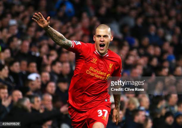Martin Skrtel of Liverpool celebrates after scoring the opening goal during the Barclays Premier League match between Chelsea and Liverpool at...
