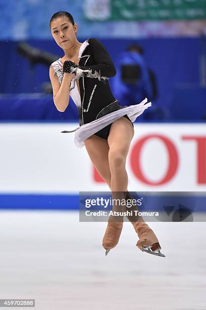 Kanako Murakami of Japan competes in the Ladies Free Program during day two of ISU Grand Prix of Figure Skating 2014/2015 NHK Trophy at the Namihaya...