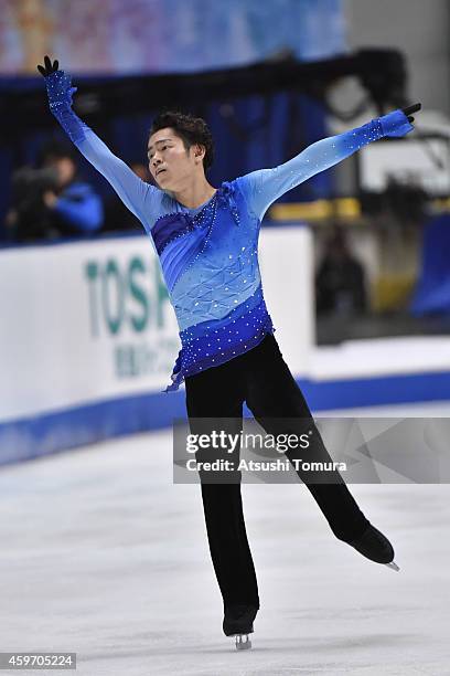 Daisuke Murakami of Japan competes in the Men Free Skating during day two of ISU Grand Prix of Figure Skating 2014/2015 NHK Trophy at the Namihaya...