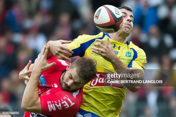 Clermont's fullback Jean-Marcelin Butin vies with RC Toulon's winger Drew Mitchell during the French Top 14 rugby union match RC Toulon vs Clermont...