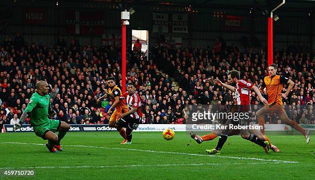 Alan Judge of Brentford shoots and scores past Carl Ikem the Wolverhampton Wanderers goalkeeper during the Sky Bet Championship match between...