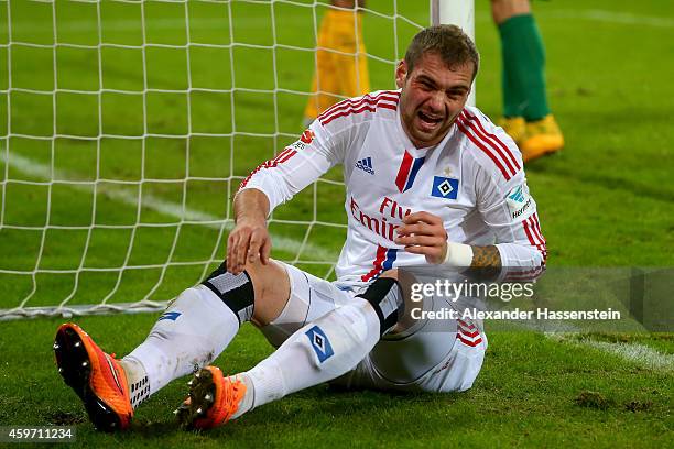 Pierre-Michel Lasogga of Hamburg reacts during the Bundesliga match between FC Augsburg and Hamburger SV at SGL Arena on November 29, 2014 in...