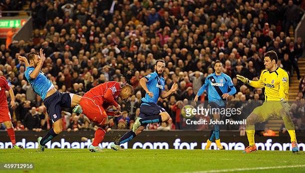 Glen Johnson of Liverpool scores to make it 1-0 during the Barclays Premier Leauge match between Liverpool and Stoke City at Anfield on November 29,...