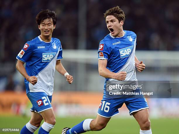 Pirmin Schwegler of Hoffenheim celebrates with his team-mates after scoring his team's first goal during the Bundesliga match between 1899 Hoffenheim...