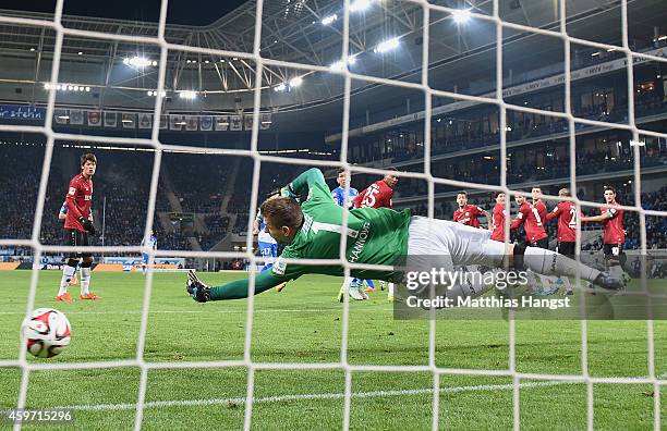 Pirmin Schwegler of Hoffenheim scores his team's first goal past goalkeeper Ron-Robert Zieler of Hannover during the Bundesliga match between 1899...