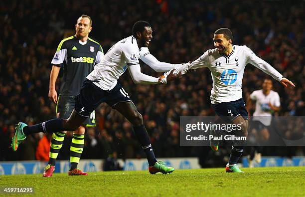 Aaron Lennon of Tottenham Hotspur celebrates his team's third goal with Emmanuel Adebayor during the Barclays Premier League match between Tottenham...