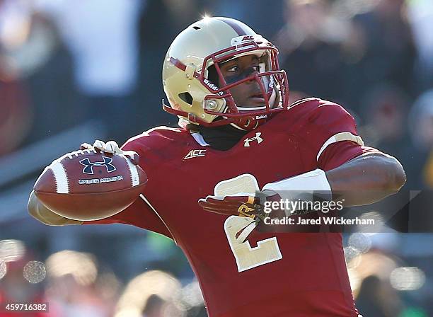 Tyler Murphy of the Boston College Eagles drops back to throw a pass against the Syracuse Orangemen in the first half during the game at Alumni...