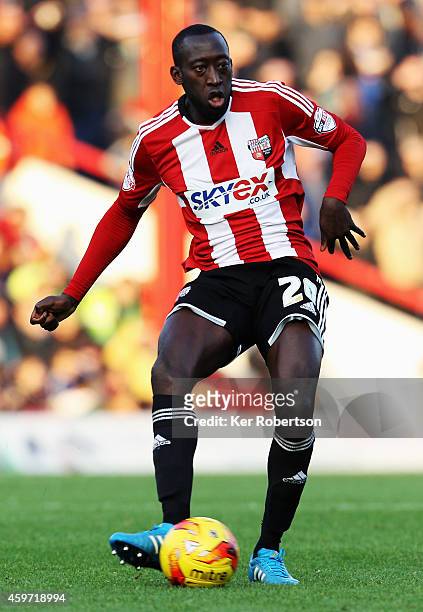 Toumani Diagouraga of Brentford runs with the ball during the Sky Bet Championship match between Brentford and Wolverhampton Wanderers at Griffin...