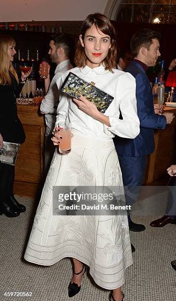 Alexa Chung attends the British Fashion Awards Nominees' Dinner hosted by Grey Goose at the Soho House Pop-Up on November 29, 2014 in London, England.