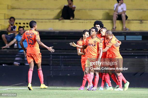 Players of Sport congratulates Pascoa for his goal, second of Sport, during a match between Criciuma and Sport as part of Campeonato Brasileiro 2014...