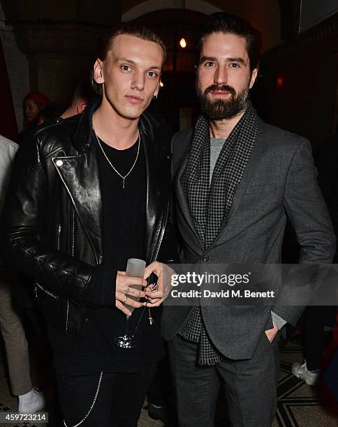 Jamie Campbell Bower and Jack Guinness attend the British Fashion Awards Nominees' Dinner hosted by Grey Goose at the Soho House Pop-Up on November...