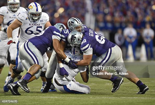 Jordan Riley Kansas State Defenders Will Geary and Jordan Willis of the Kansas State Wildcats ...