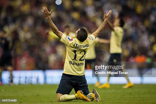 Pablo Aguilar of America celebrates after winning a match during a quarterfinal second leg match between America and Pumas UNAM as part of the...
