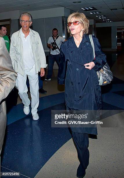 Jane Fonda and Richard Perry are seen at Los Angeles International Airport on June 08, 2012 in Los Angeles, California.