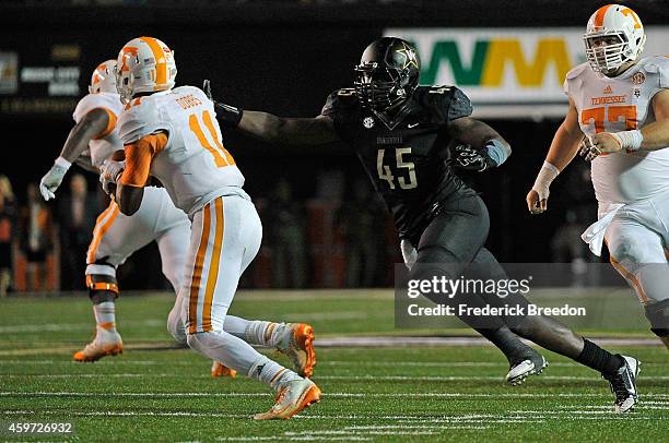 Stephen Weatherly of the Vanderbilt Commoroders sacks quarterback Joshua Dobbs of the Tennessee Volunteers during the second half of a game at...