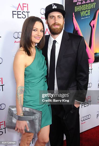 Actress Michelle Sinclair and Daniel Lockman arrive at AFI FEST 2014 Presented by Audi - Gala Premiere of 'Inherent Vice' at the Egyptian Theatre on...