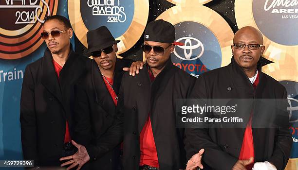 Singers DeVante Swing, Cedric 'K-Ci' Hailey, Dalvin DeGrate and Joel 'JoJo' Hailey of Jodeci arrive at the 2014 Soul Train Music Awards at the...