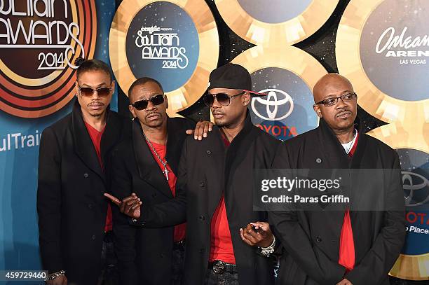 Singers DeVante Swing, Cedric 'K-Ci' Hailey, Dalvin DeGrate and Joel 'JoJo' Hailey of Jodeci arrive at the 2014 Soul Train Music Awards at the...