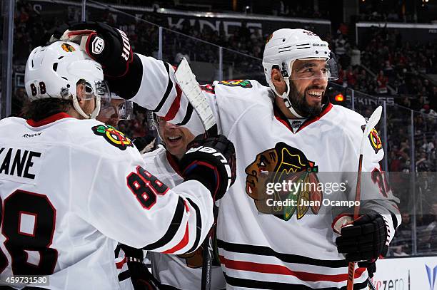 Michal Rozsival of the Chicago Blackhawks celebrates with his teammates after Brad Richards of the Chicago Blackhawks goal at STAPLES Center on...