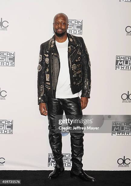 Musician Wyclef Jean poses in the press room at the 2014 American Music Awards at Nokia Theatre L.A. Live on November 23, 2014 in Los Angeles,...