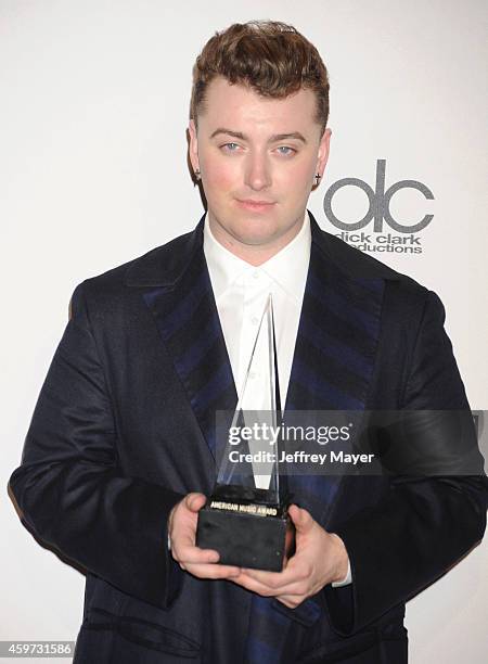 Singer Sam Smith poses in the press room at the 2014 American Music Awards at Nokia Theatre L.A. Live on November 23, 2014 in Los Angeles, California.