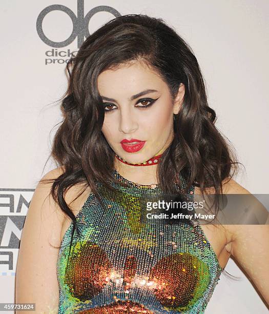 Singer Charli XCX poses in the press room at the 2014 American Music Awards at Nokia Theatre L.A. Live on November 23, 2014 in Los Angeles,...