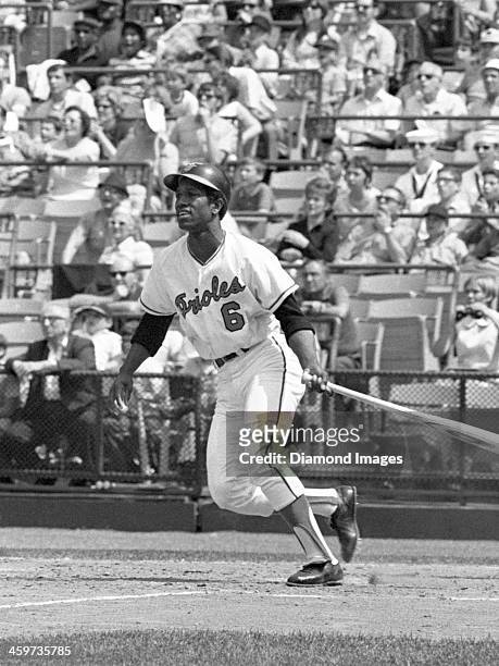 Outfielder Paul Blair of the Baltimore Orioles follows through on his swing after hitting a pitch during a game in 1970 at Memorial Stadium in...